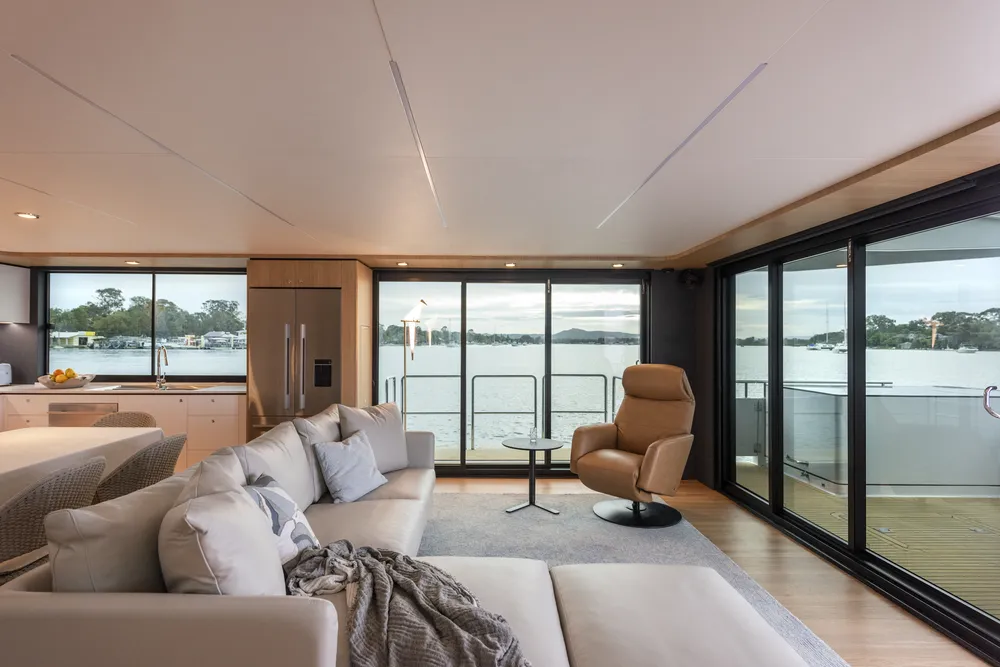 Interior lounge view of a houseboat built by Mason Marine Industries