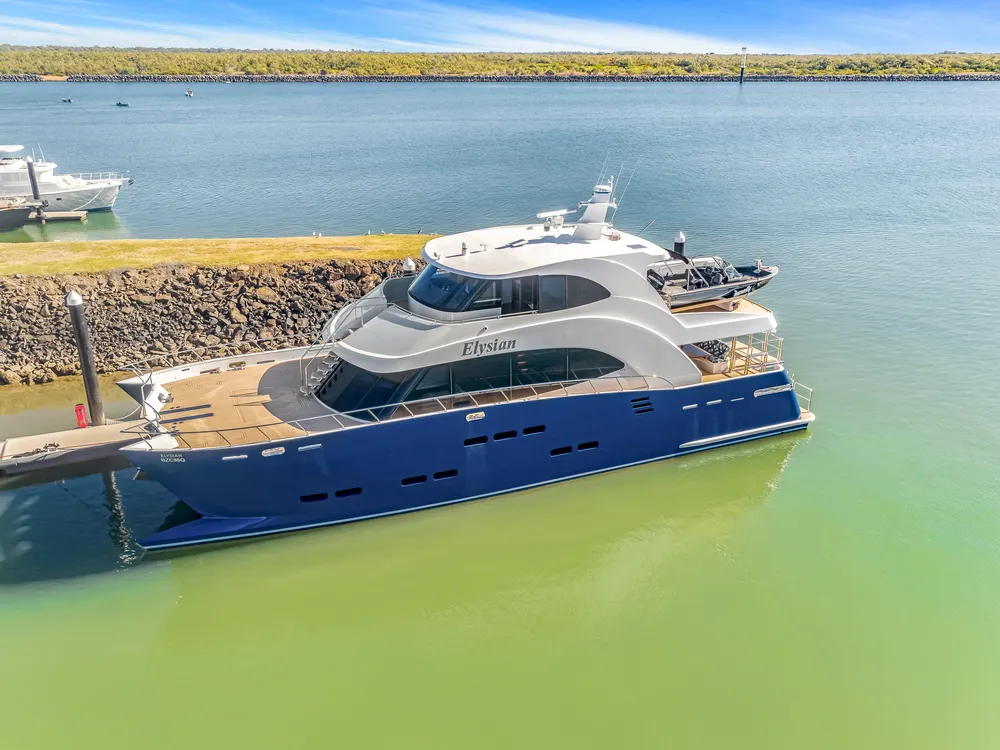 An aerial view of the Elysian docked in port, a catamaran crafted by Bundaberg boat builders Mason Marine