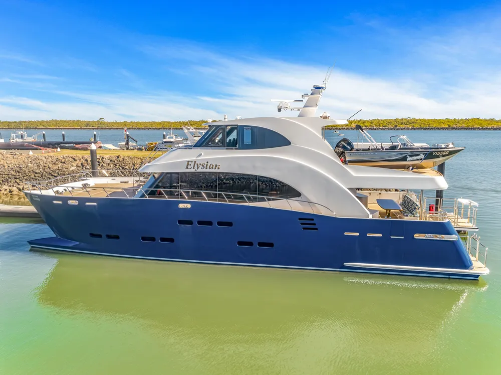 An aerial view of the Elysian docked in port, a catamaran crafted by Bundaberg boat builders Mason Marine