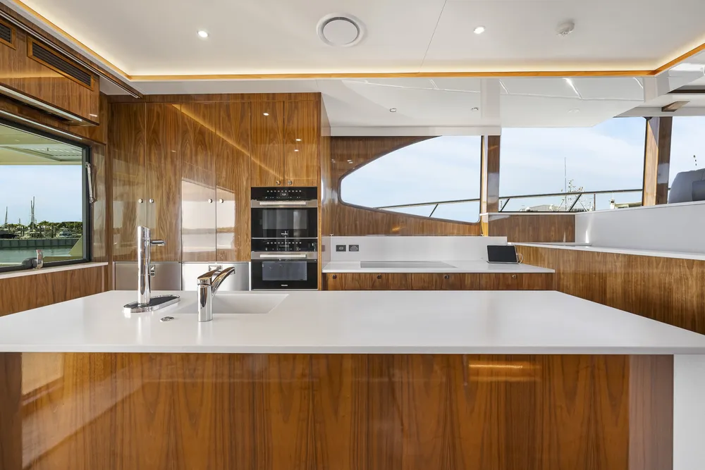 Interior kitchen view of a catamaran built by Mason Marine Industries