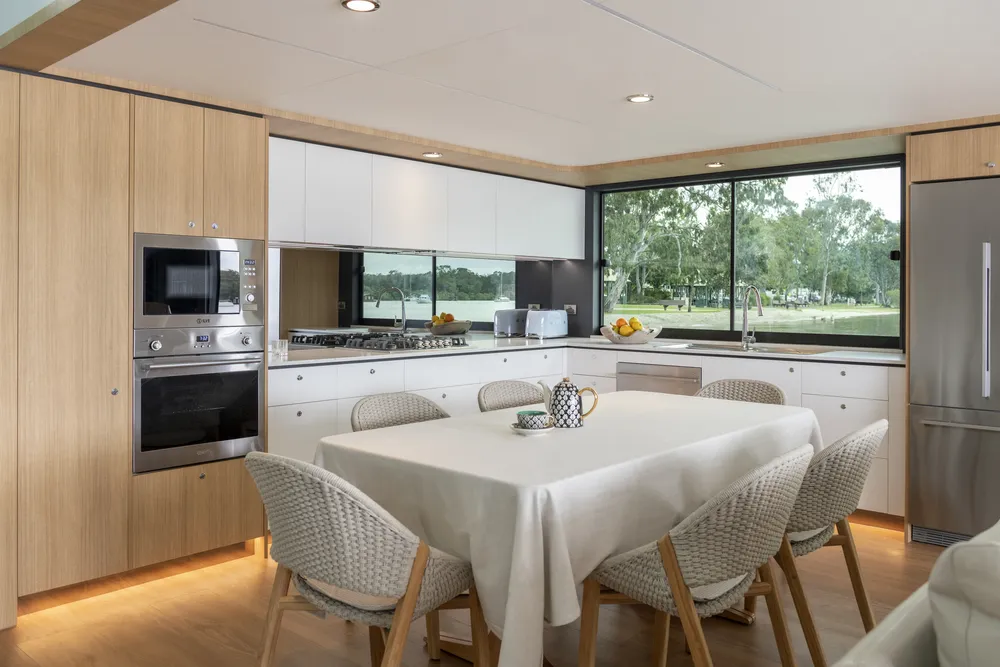 Interior kitchen view of a houseboat built by Mason Marine Industries