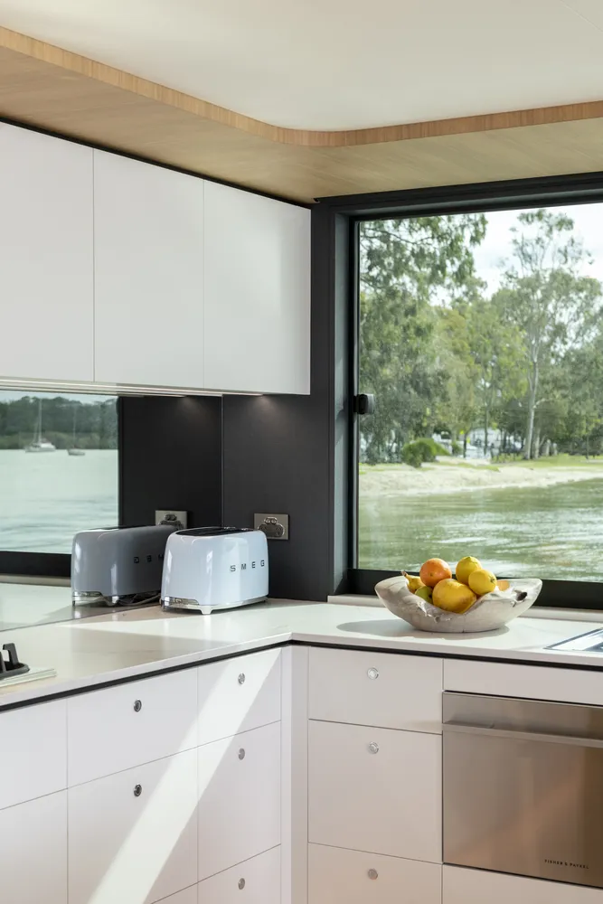 Interior kitchen view of a houseboat built by Mason Marine Industries